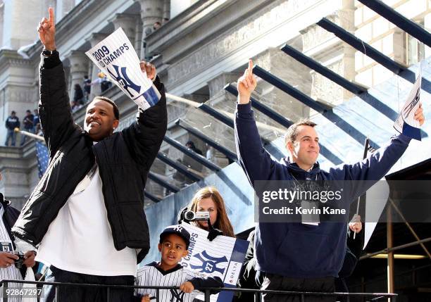 Yankee pitcher, CC Sabathia and Yankee first baseman, Mark Teixeira celebrate duing the 2009 New York Yankees World Series Victory Parade on November...