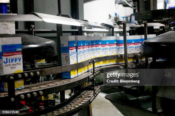 Jiffy cornbread mix boxes move along a conveyor belt at the Chelsea Milling Co. Jiffy Mix production facility in Chelsea, Michigan, U.S., on Friday,...