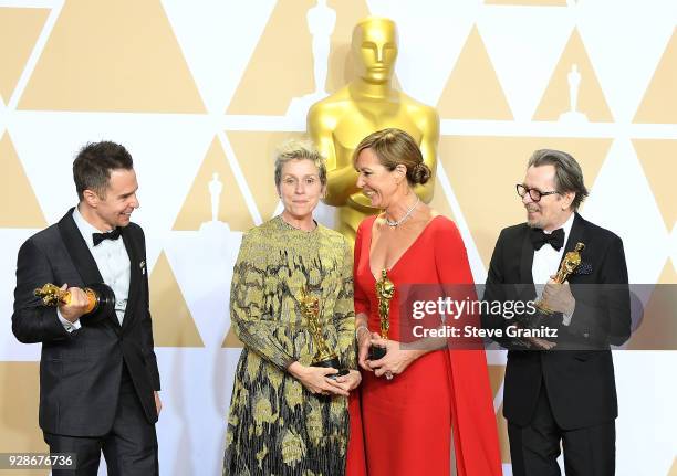 Actor Sam Rockwell, winner of the Best Supporting Actor award for 'Three Billboards Outside Ebbing, Missouri', actor Frances McDormand, winner of the...