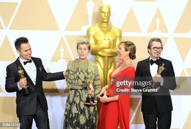 Actor Sam Rockwell, winner of the Best Supporting Actor award for 'Three Billboards Outside Ebbing, Missouri', actor Frances McDormand, winner of the...