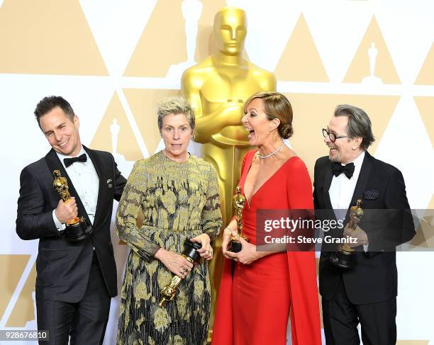 Actor Sam Rockwell, winner of the Best Supporting Actor award for 'Three Billboards Outside Ebbing, Missouri', actor Frances McDormand, winner of the...