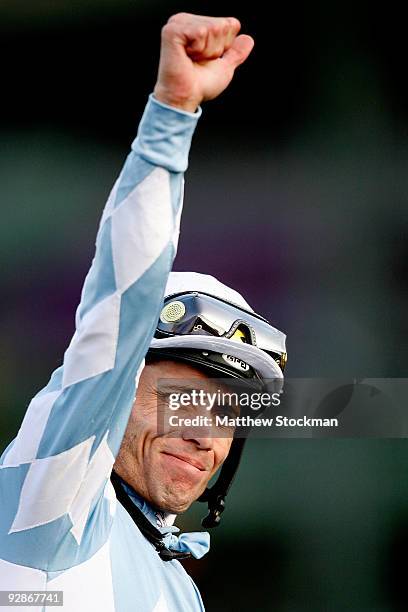 Jockey Garrett Gomez celebrates after winning the Breeders' Cup Ladies Classic race with Life Is Sweet during the Breeders' Cup World Championships...