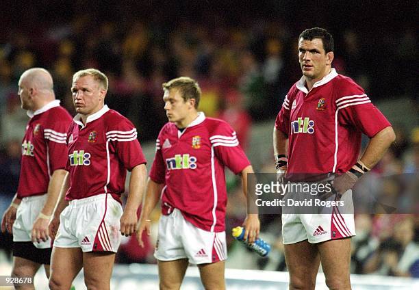 Keith Wood, Neil Back, Jonny Wilkinson and Martin Johnson of the British and Irish Lions look on dejected against Australia during the second Test...