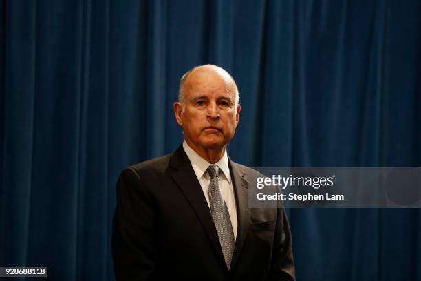 California Governor Jerry Brown speaks during a press conference at the California State Capitol on March 7, 2018 in Sacramento, California. The...