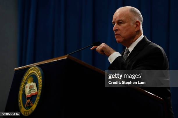 California Governor Jerry Brown speaks during a press conference at the California State Capitol on March 7, 2018 in Sacramento, California. The...