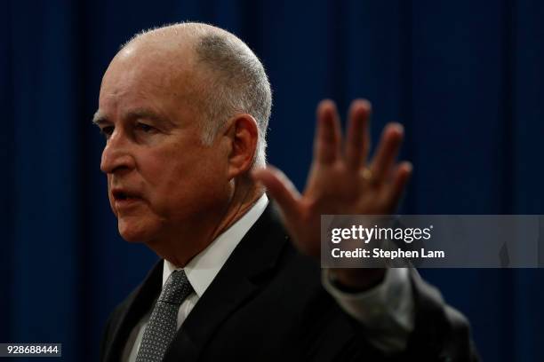 California Governor Jerry Brown speaks during a press conference at the California State Capitol on March 7, 2018 in Sacramento, California. The...