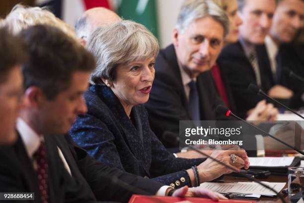 Theresa May, U.K. Prime minister, center, speaks with Mohammed bin Salman, Saudi Arabia's crown prince, not pictured, during a meeting inside number...
