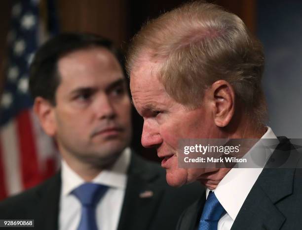 Sen. Marco Rubio, , , and Sen. Bill Nelson , speak to the media while unveiling legislation on gun violence restraining orders in the wake of the...