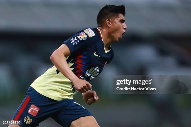 Joe Corona of America celebrates after scoring the first goal of his team during the match between America and Tauro FC as part of the CONCACAF...