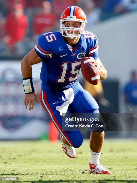 Quarterback Tim Tebow of the Florida Gators against the Georgia Bulldogs at Jacksonville Municipal Stadium on October 31, 2009 in Jacksonville,...