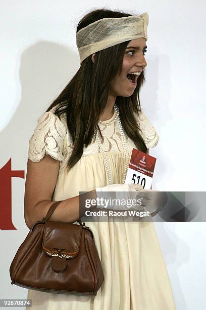 Winner of the Fashions on the Field, Athena Efremidis reacts when her name is announced at Emirates Stake Day at Flemington Racecourse on November 7,...