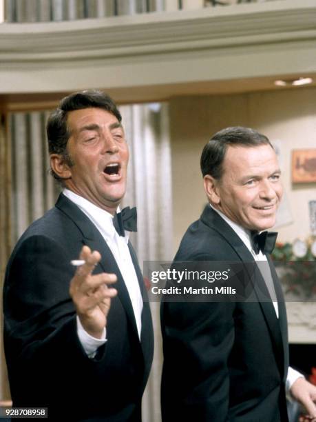 Entertainers Dean Martin and Frank Sinatra perform during the taping of 'The Dean Martin Show' circa 1967 in Los Angeles, California.