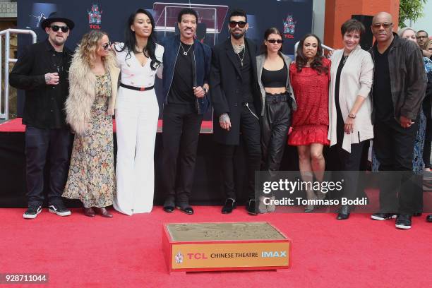 Lionel Richie and family attend the Lionel Richie Hand And Footprint Ceremony at TCL Chinese Theatre on March 7, 2018 in Hollywood, California.