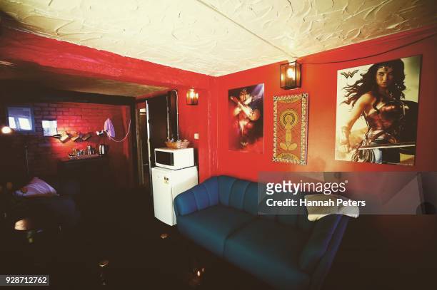 Snacks and drinks are provided in the communal lounge where sex workers arrive ahead of bookings with clients at The Bach, an ethical escort service,...