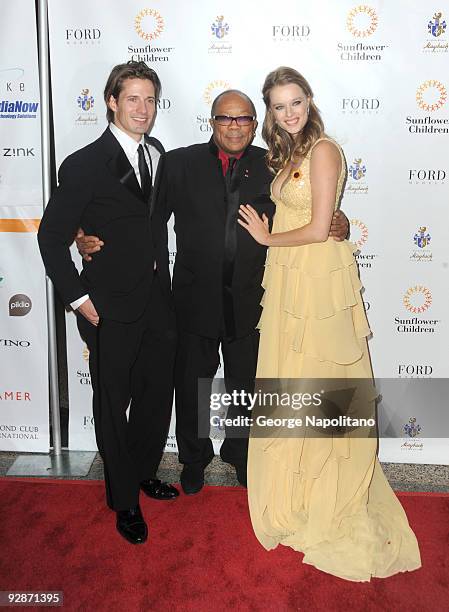 Lane Carlson,Executive Director of Sunflower Children, Quincey Jones and Helena Houdova,Founder of Sunflower Children attends the 3rd Annual Poker...
