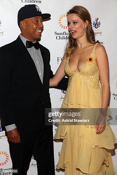 Russell Simmons and founder of Sunflower Children, Helena Houdova attend the Sunflower Children's 3rd Annual Poker, Fashion and Sports Gala at the...