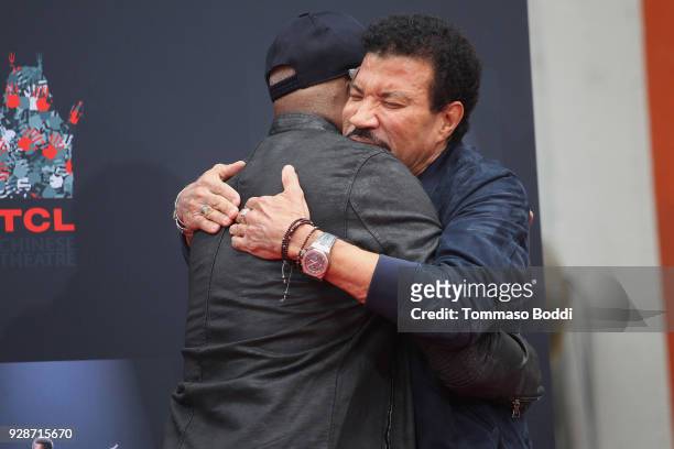 Samuel L. Jackson and Lionel Richie attend the Lionel Richie Hand And Footprint Ceremony at TCL Chinese Theatre on March 7, 2018 in Hollywood,...