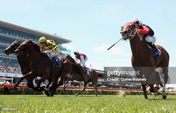 Glen Boss riding It'llbefantastic crosses the line to win the Hilton Stakes during the 2009 Emirates Stakes Day meeting at Flemington Racecourse on...