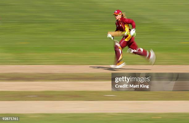 Jodie Fields of the Fire runs between the wickets during the WNCL match between the New South Wales Breakers and the Queensland Fire at North Sydney...