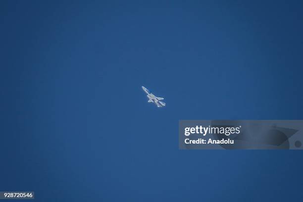 War plane belonging to Assad Regime carries out airstrikes over Kafr Batna region of the Eastern Ghouta region of Damascus in Syria on March 7, 2018....