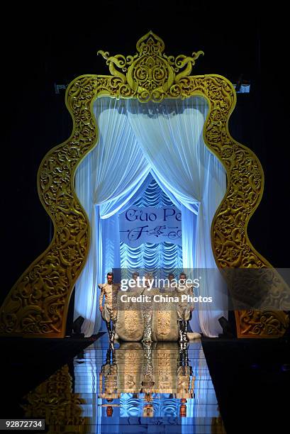 Model Carmen Dell' Orefice walks the runway in the 'Rosestudio' Guo Pei High Class Fashion Show 2010 during China Fashion Week on November 6, 2009 in...