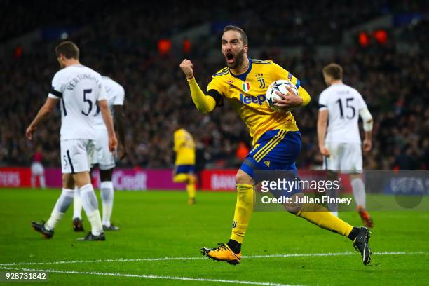 Gonzalo Higuain of Juventus celebrates after scoring the equalising goal during the UEFA Champions League Round of 16 Second Leg match between...