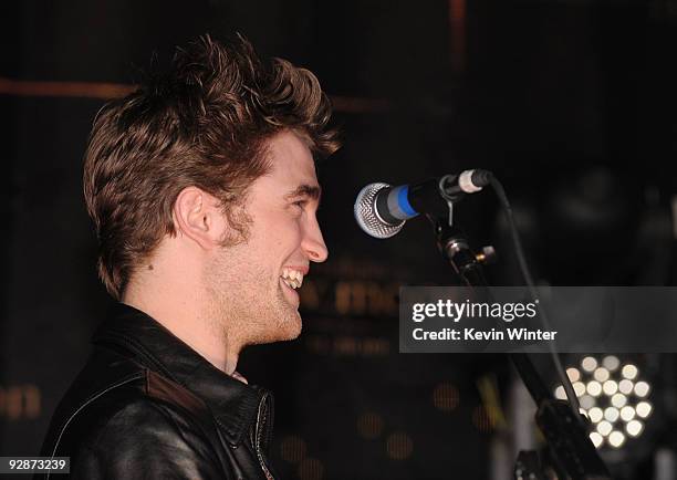 Actor Robert Pattinson appears onstage at Summit's "The Twilight Saga: New Moon" Cast Tour at Hollywood and Highland on November 6, 2009 in Los...