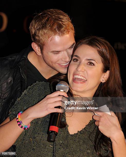 Actors Kellan Lutz and Nikki Reed appear onstage at Summit's "The Twilight Saga: New Moon" Cast Tour at Hollywood and Highland on November 6, 2009 in...