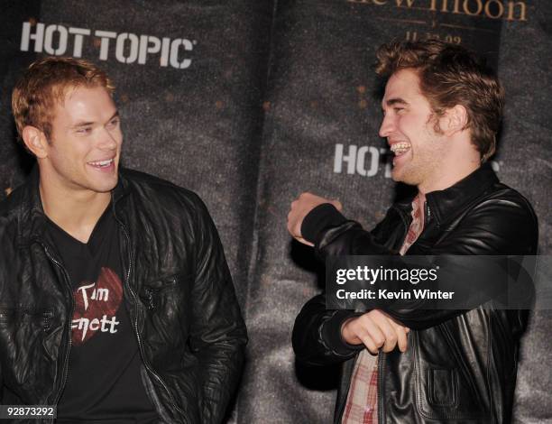 Actors Kellan Lutz and Robert Pattinson appear onstage at Summit's "The Twilight Saga: New Moon" Cast Tour at Hollywood and Highland on November 6,...