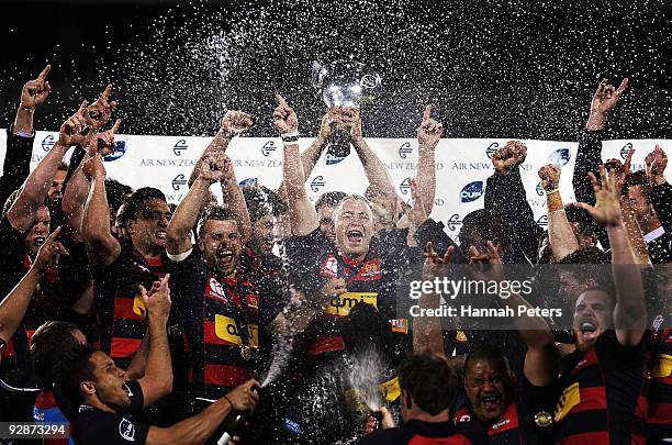 Canterbury players celebrate with the trophy after the Air New Zealand Cup Final match between Canterbury and Wellington at AMI Stadium on November...