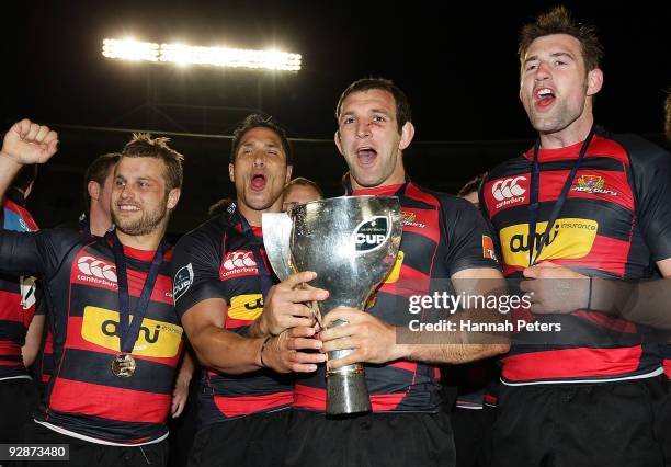 Tyson Keats, Steven Brett, George Whitelock and Michael Paterson of Canterbury celebrate with the trophy after the Air New Zealand Cup Final match...