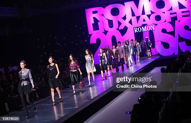 Models walk the runway in the 'ROMON' L&XF Men's Wear Fashion Show S/S 2010 during China Fashion Week on November 6, 2009 in Beijing, China.