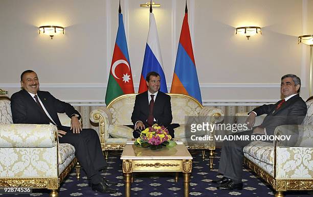 Russian President Dmitry Medvedev meets with Presidents Ilham Aliyev of Azerbaijan and Serzh Sarkisian of Armenia in Chisinau on October 9, 2009...