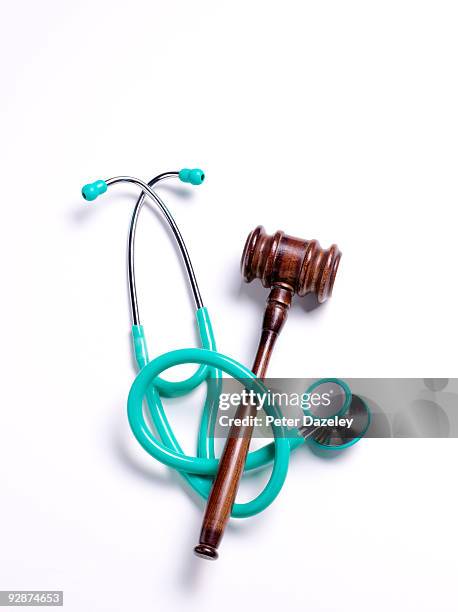 stethoscope and gavel. - regulatory scrutiny stock pictures, royalty-free photos & images