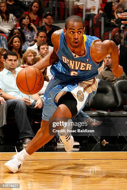 Arron Afflalo of the Denver Nuggets drives against the Miami Heat on November 6, 2009 at the American Airlines Arena in Miami, Florida. NOTE TO USER:...