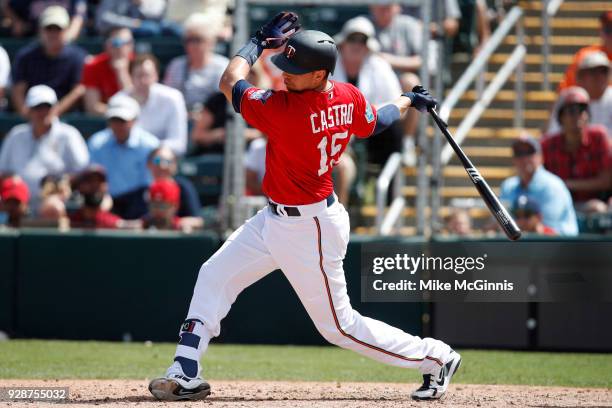 Jason Castro of the Minnesota Twins makes some contact at the plate during the game against the Baltimore Orioles at Hammond Stadium on March 06,...