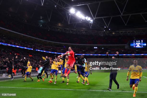 Juventus players celebrate at the end of the UEFA Champions League Round of 16 Second Leg match between Tottenham Hotspur and Juventus at Wembley...