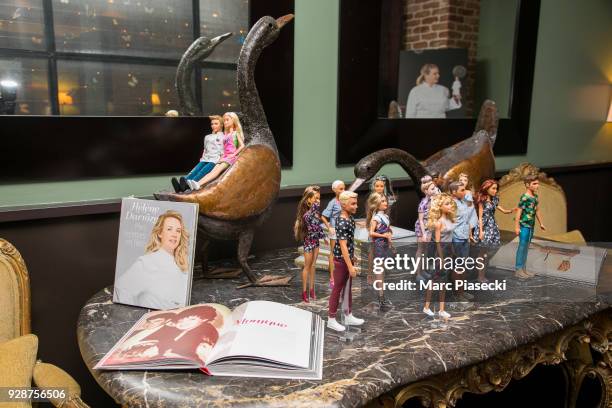 Close-up at Barbie dolls ahead Mattel honoring global role models on International Women's Day at Helene Darroze Restaurant on March 7, 2018 in...