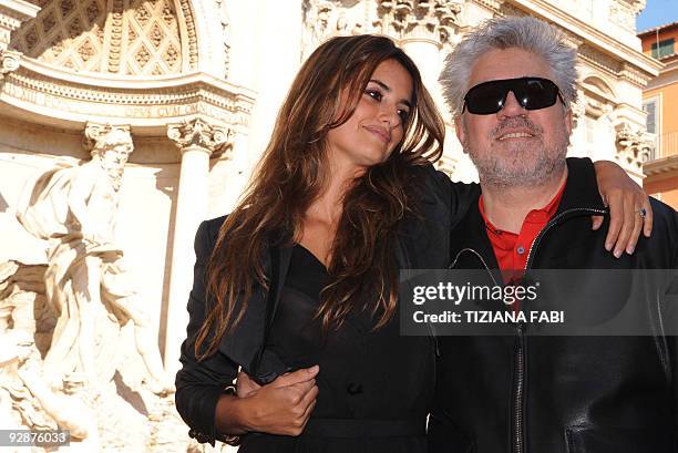 Spanish actress Penelope Cruz and Spanish film director Pedro Almodovar pose at the Fontana Di Trevi for the photocall of "Los Abrazos Roto" on...