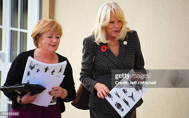 Margaret Darling and Barbara Melander the wife of Mervyn King, take a walk outside the G20 finance ministers meeting on November 7, 2009 in St...