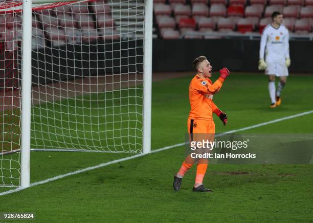 Newcastle keeper Paul Woolston celebrates winning the penalty shoot out during the Premier League International Cup match between Sunderland U23 and...