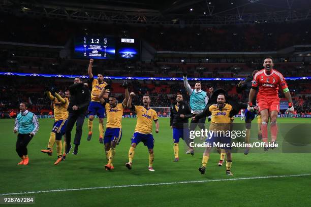 Juventus players celebrate during the UEFA Champions League Round of 16 Second Leg match between Tottenham Hotspur and Juventus at Wembley Stadium on...