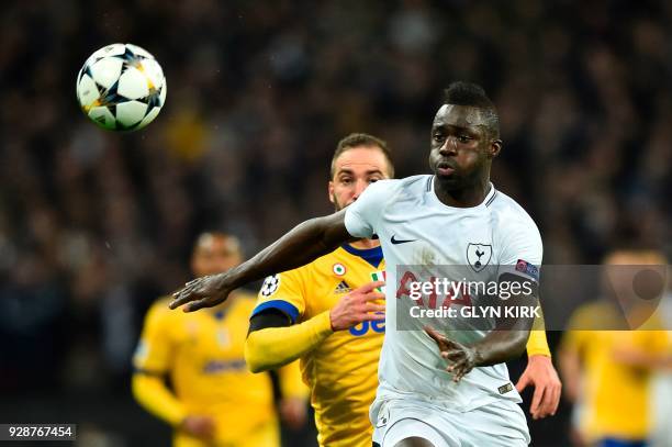 Tottenham Hotspur's Colombian defender Davinson Sanchez chases the ball during the UEFA Champions League round of sixteen second leg football match...