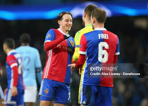 Luca Zuffi, Tomas Vaclik and Fabian Frei of FC Basel after the UEFA Champions League Round of 16 Second Leg match between Manchester City and FC...