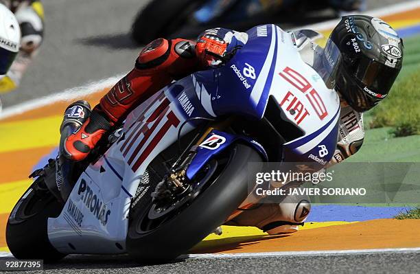 Spanish MotoGP rider Jorge Lorenzo takes a curve during the Valencia MotoGP Grand Prix qualifying session at the Ricardo Tormo race track in Cheste...