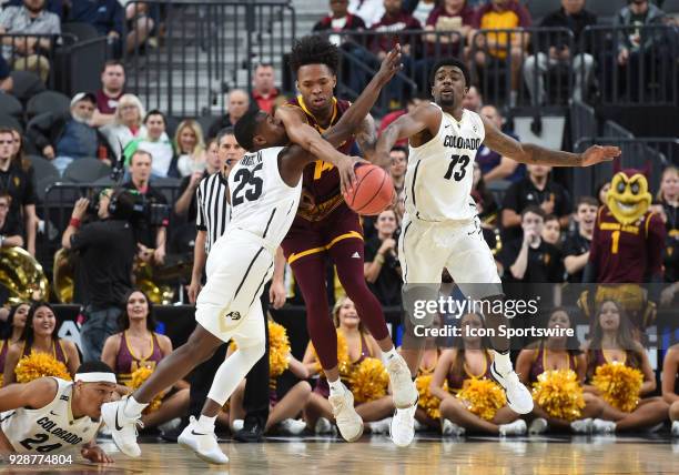 Colorado guard McKinley Wright IV Arizona State forward Kimani Lawrence , and Colorado guard Namon Wright fight for a loose ball during the PAC-12...