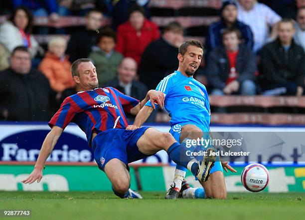 Crystal Palace's Clint Hill slides for the ball with Middlesbrough's Gary O'Neil during the Coca Cola Championship match between Crystal Palace and...