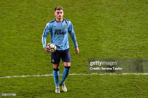 Luke Charman of Newcastle United walks out holding the ball to open up the penalty shoot out during the Premier League International Cup between...