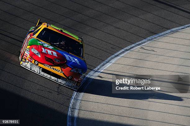 Kyle Busch drives the M&M's Toyota during practice for the NASCAR Sprint Cup Series Dickies 500 at Texas Motor Speedway on November 7, 2009 in Fort...