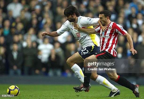 Vedran Corluka of Tottenham Hotspur and Steed Malbranque of Sunderland during the Barclays Premier League match between Tottenham Hotspur and...